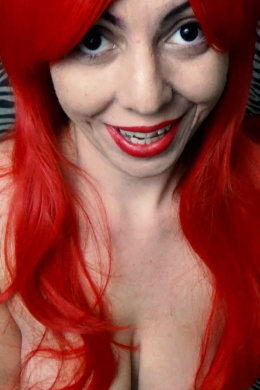 Red Wigged Slut Rides Red Dildo